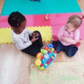 Kids playing at Tammy's Tiny Tots Nursery Kids playing at Tammy's Tiny Tots Nursery
